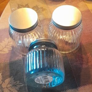 Set of Three Glass Storage Jars with Silver Lids